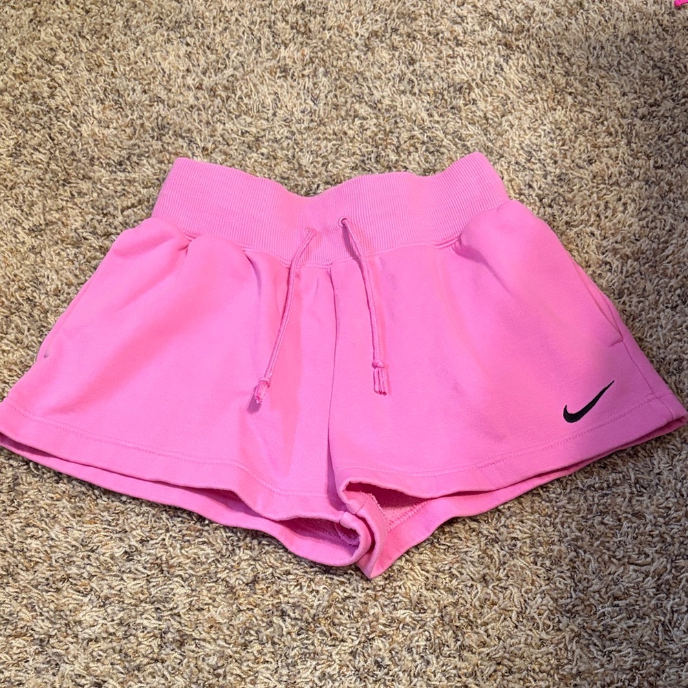 Nike Women's Bright Pink Athletic Shorts with Black Swoosh